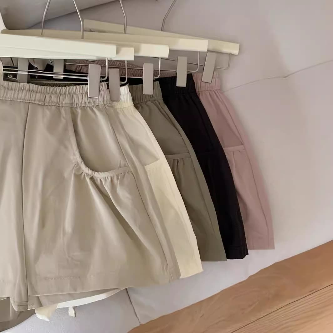 ベージュパンツ レディース ゆったりポケット付きリラックスショートパンツ