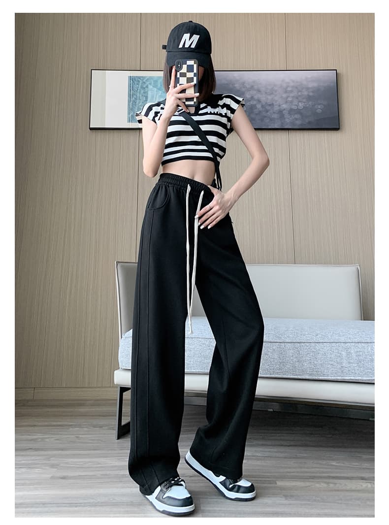 ベージュパンツ レディース ゆったりドローコード入り美脚パンツ