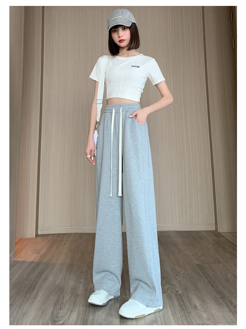 ベージュパンツ レディース ゆったりドローコード入り美脚パンツ